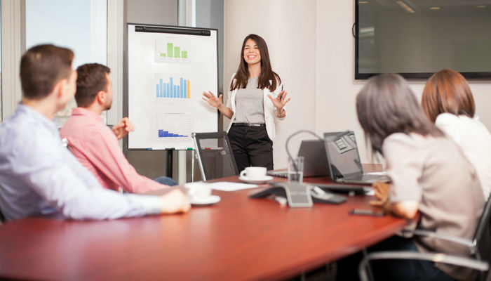 Woman pitching her business to venture capitalists