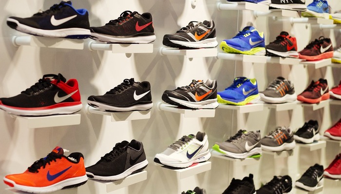 Assortment of Nike trainers on sale at a footwear store