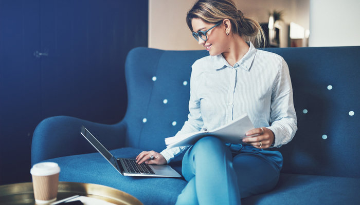 business woman with entrepreneurial mindset working on her laptop