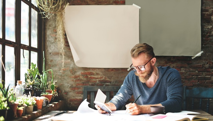 An entrepreneur analysing paperwork